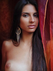 Natania makes a great debut, surprising viewers with her wonderfully tanned body with defined hips, and long, athletic legs.
