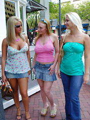 Three hot busty babes get down and dirty