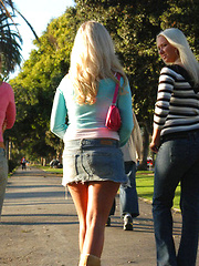 Cute brunette gets violated by two blondes